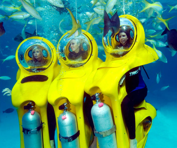 Bob diving with 3 girls